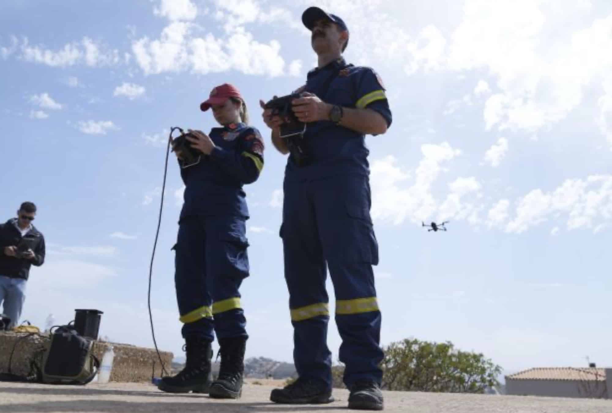 During The “Through Fire 2025” Drill In Lavrio, Approximately 37 Miles Southeast Of Athens, Greece, Firefighters Operate A Drone On Thursday, May 22, 2025. Photo Courtesy Of Associated Press / Thanassis Stavrakis