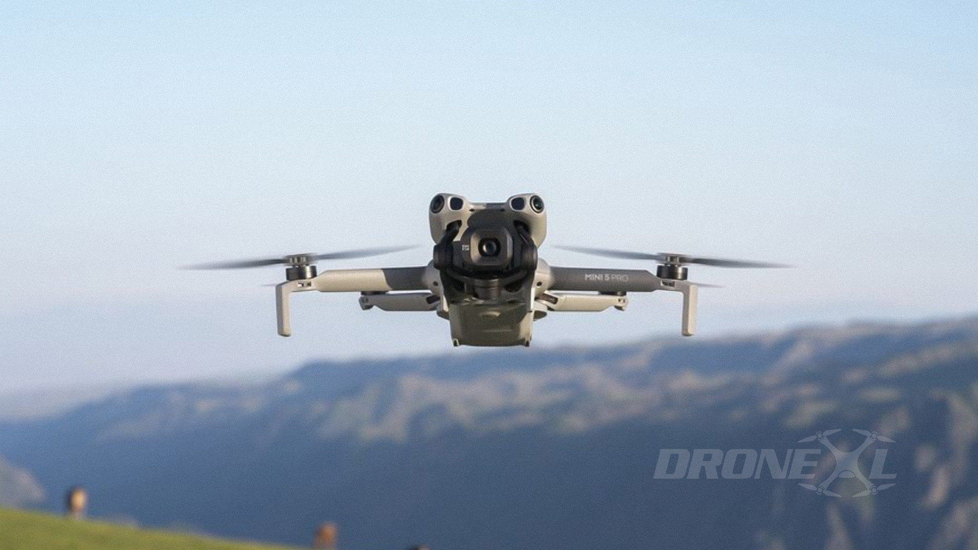 DJI Mini 5 Pro promotion image, showing the real drone in front view.