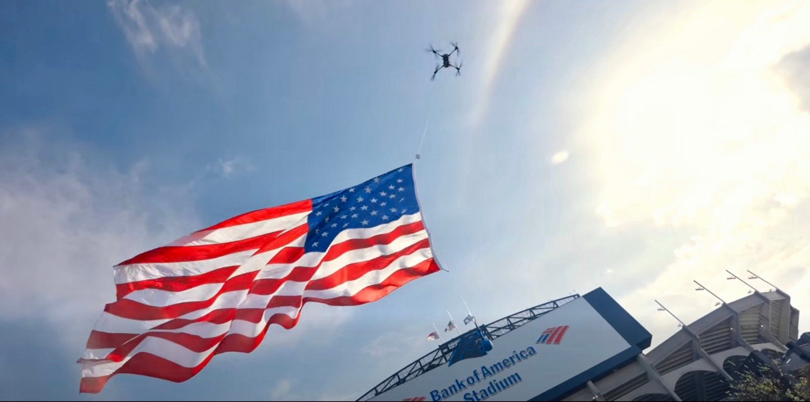 Asheville Police Drone Flies 20X30-Foot American Flag At Nfl Stadium, Claims League Record