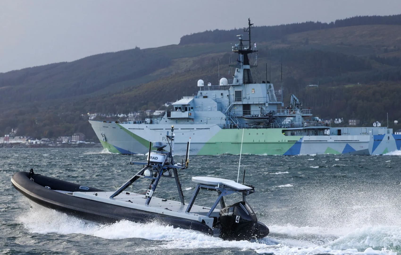 Royal Navy'S Hms Tyne Being Escorted By A Uncrewed Survace Vehicle (Usv), Or Drone Ships