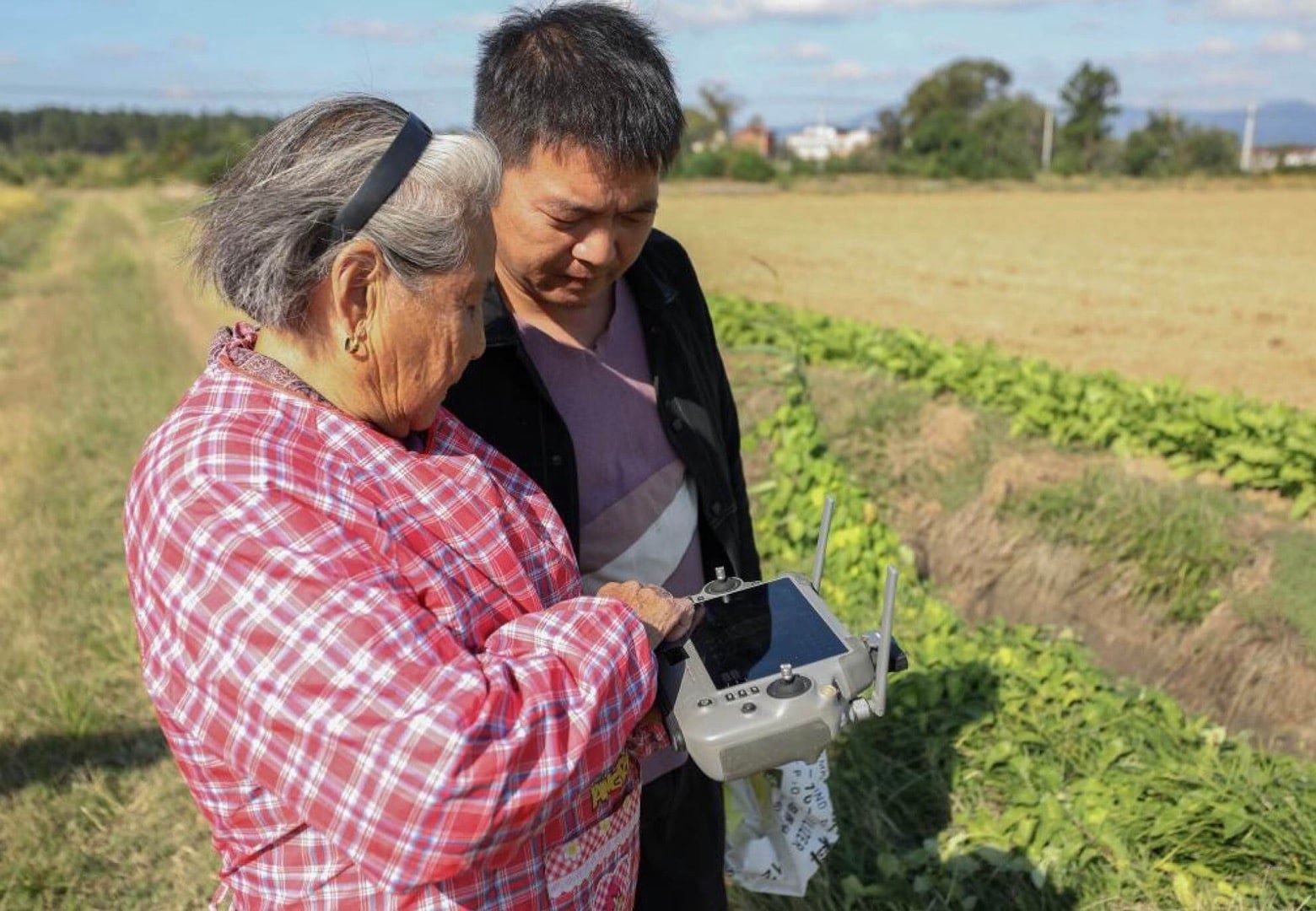 Dji Agras Meets An 82-Year-Old Farmer China'S 'Hardcore Grandma' Proves Age Is No Barrier To Agricultural Drone Mastery Photo