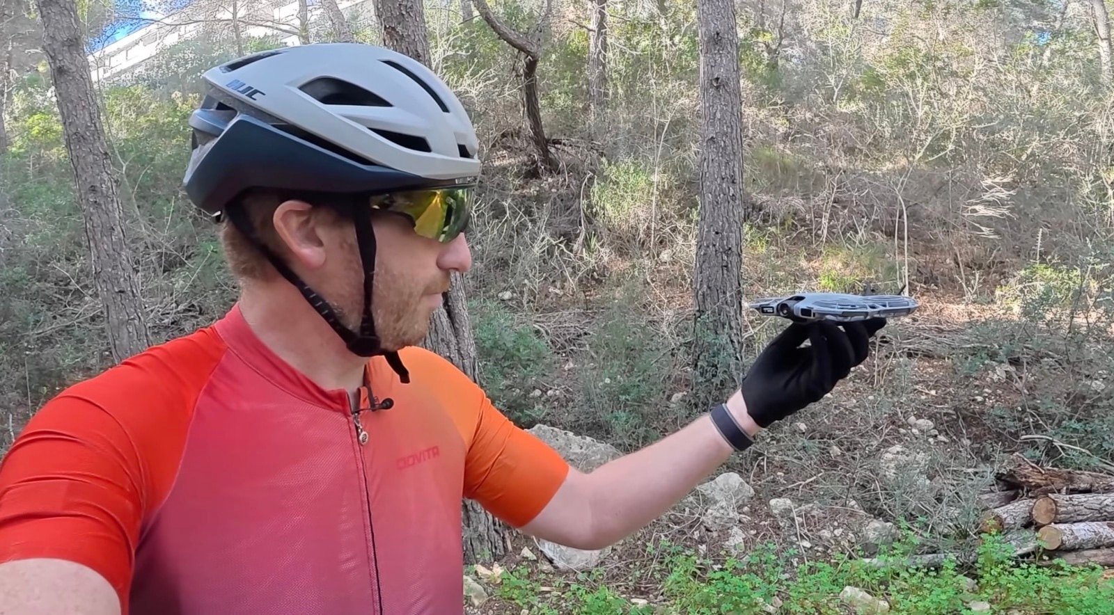 Person Holding A Drone In Nature. Dji Neo 2 Gauntlet Test: From Tight Trails To Abandoned Resorts At 48 Km/H