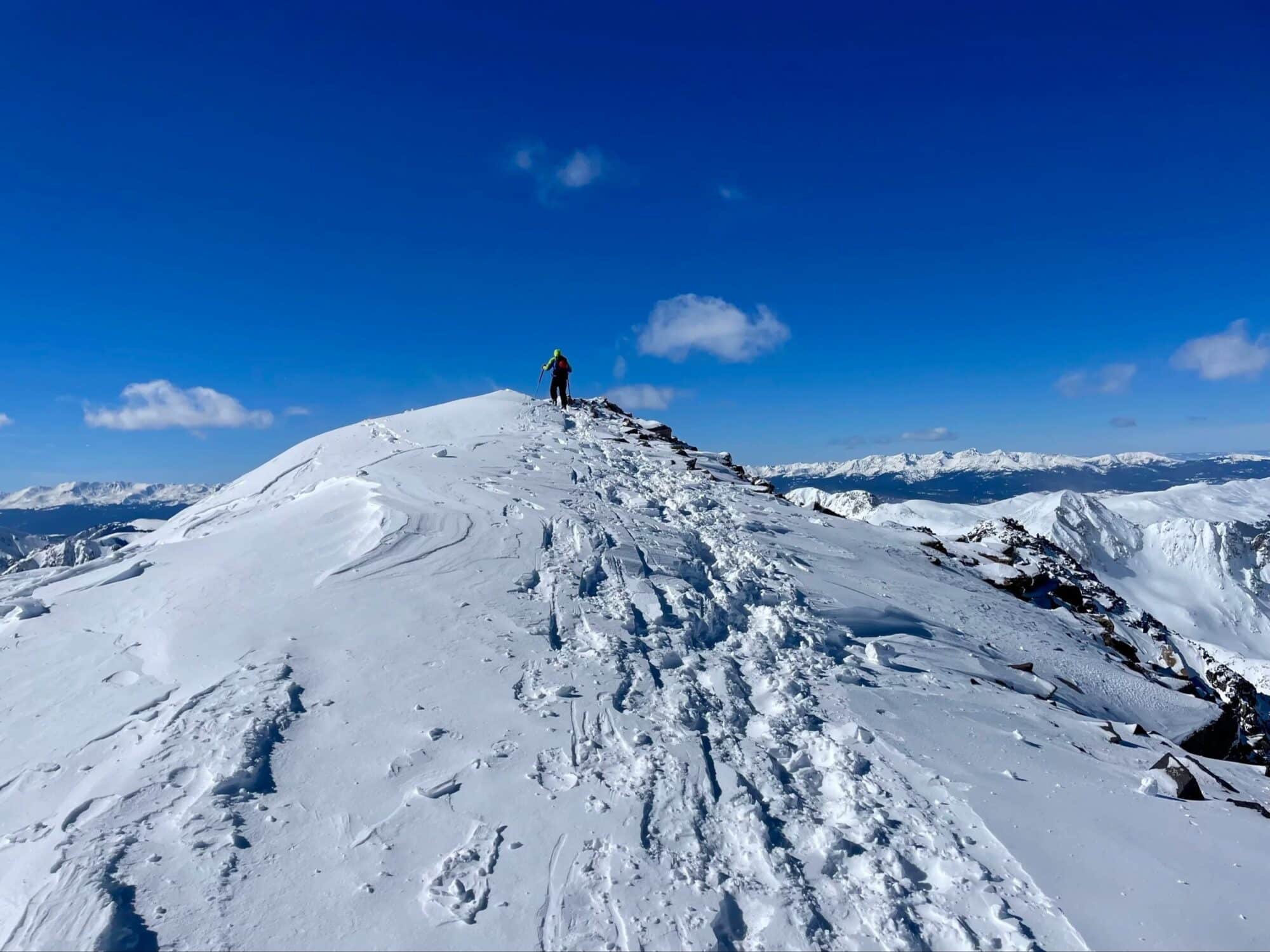 Hiker Ascending Quandary Peak, The Most Commonly Hiked 14Er In Colorado | Photo Credits: Krista Hughes