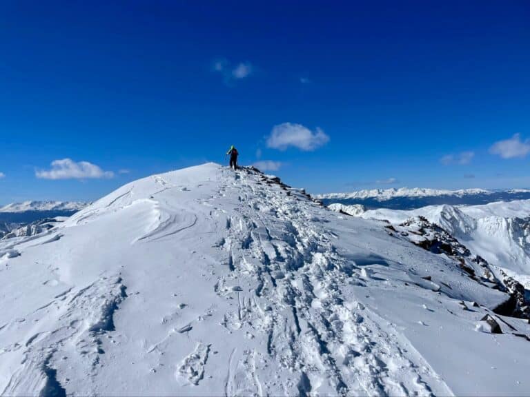 Hiker Ascending Quandary Peak, The Most Commonly Hiked 14Er In Colorado | Photo Credits: Krista Hughes